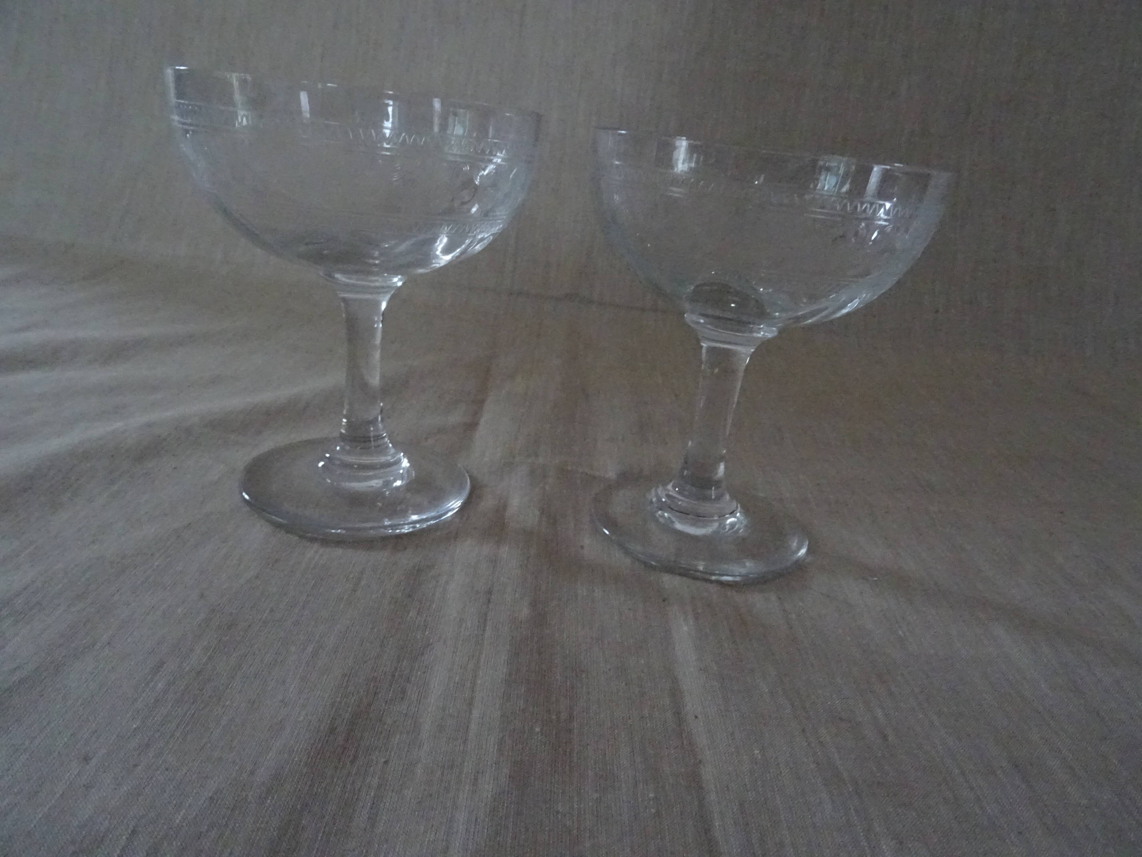 Pair of old crystal champagne glasses wide frieze right foot