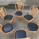Series of 6 bistro chairs in curved wood seated skaï black