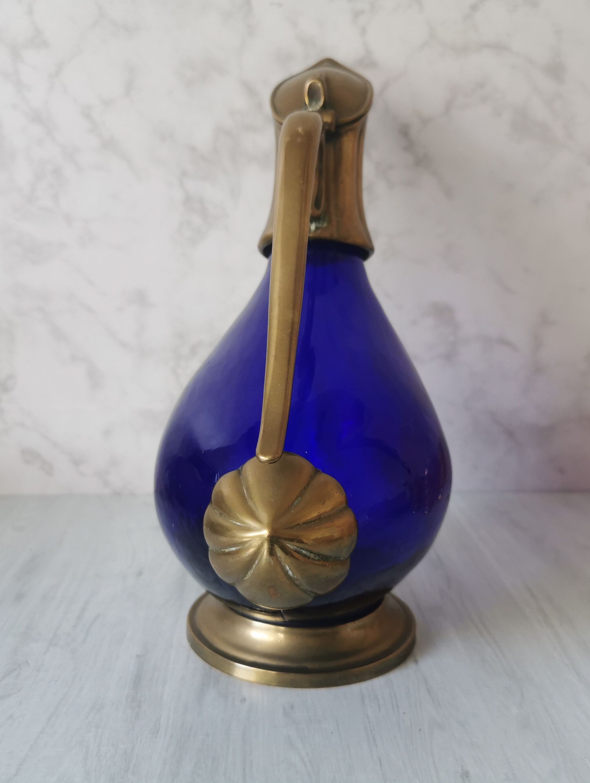 Glass and brass decanter
