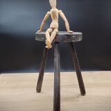 Massive black tripod stool