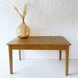 Wooden table with drawer