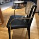 Black leather black wooden cannage chair with armrests