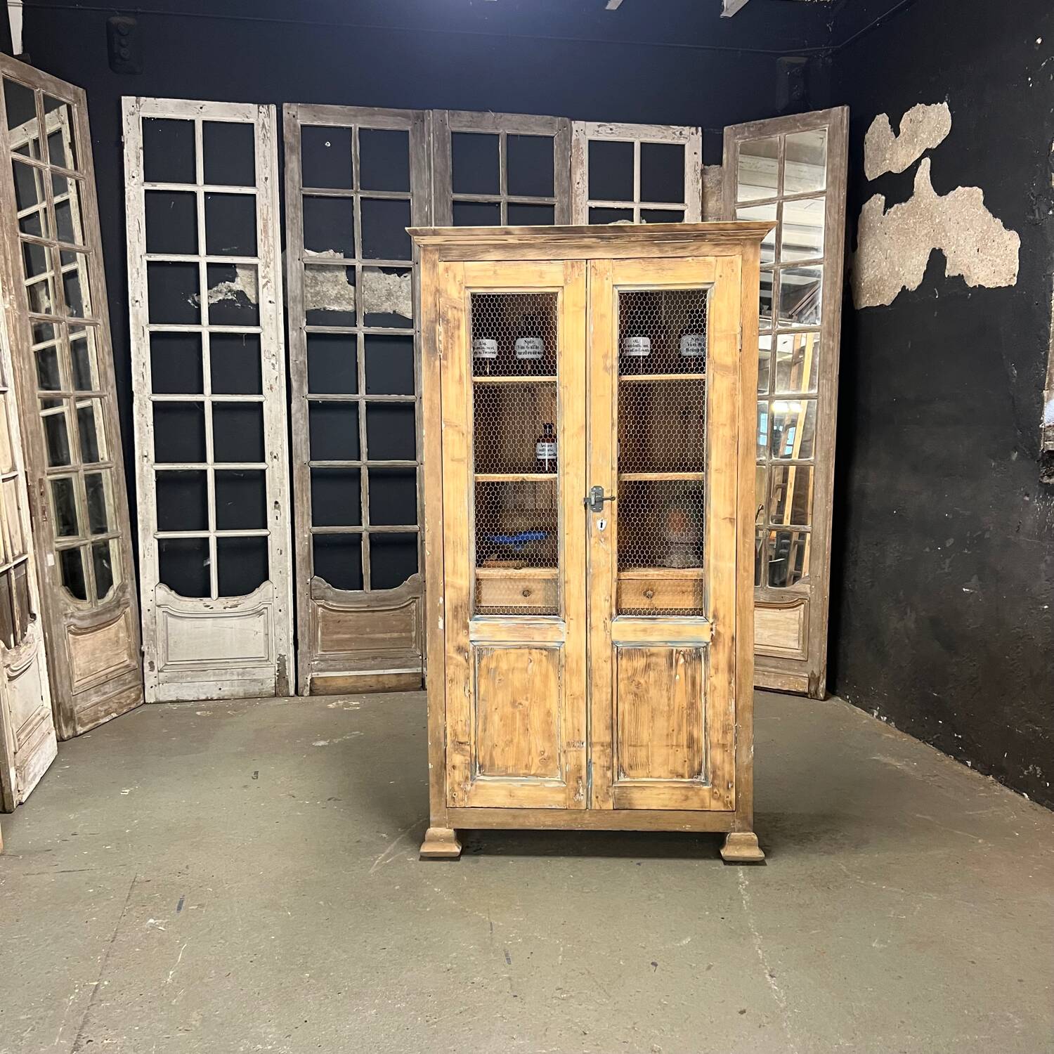 Old patinated mesh cupboard