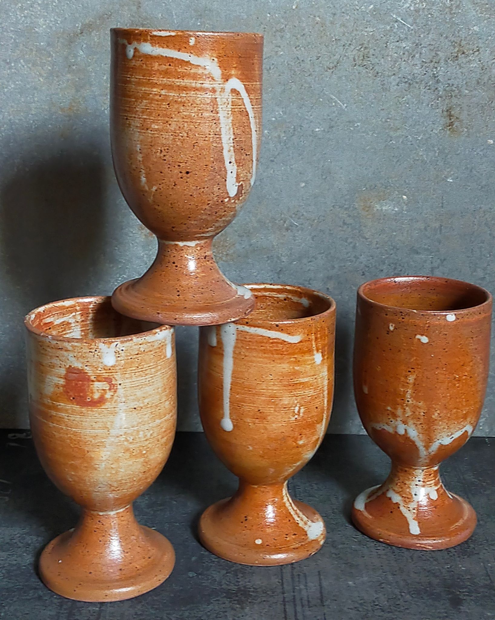 Four potter's mugs turned in vintage light stoneware
