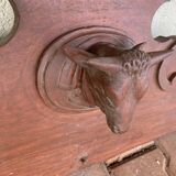 Log frontispiece with ox heads