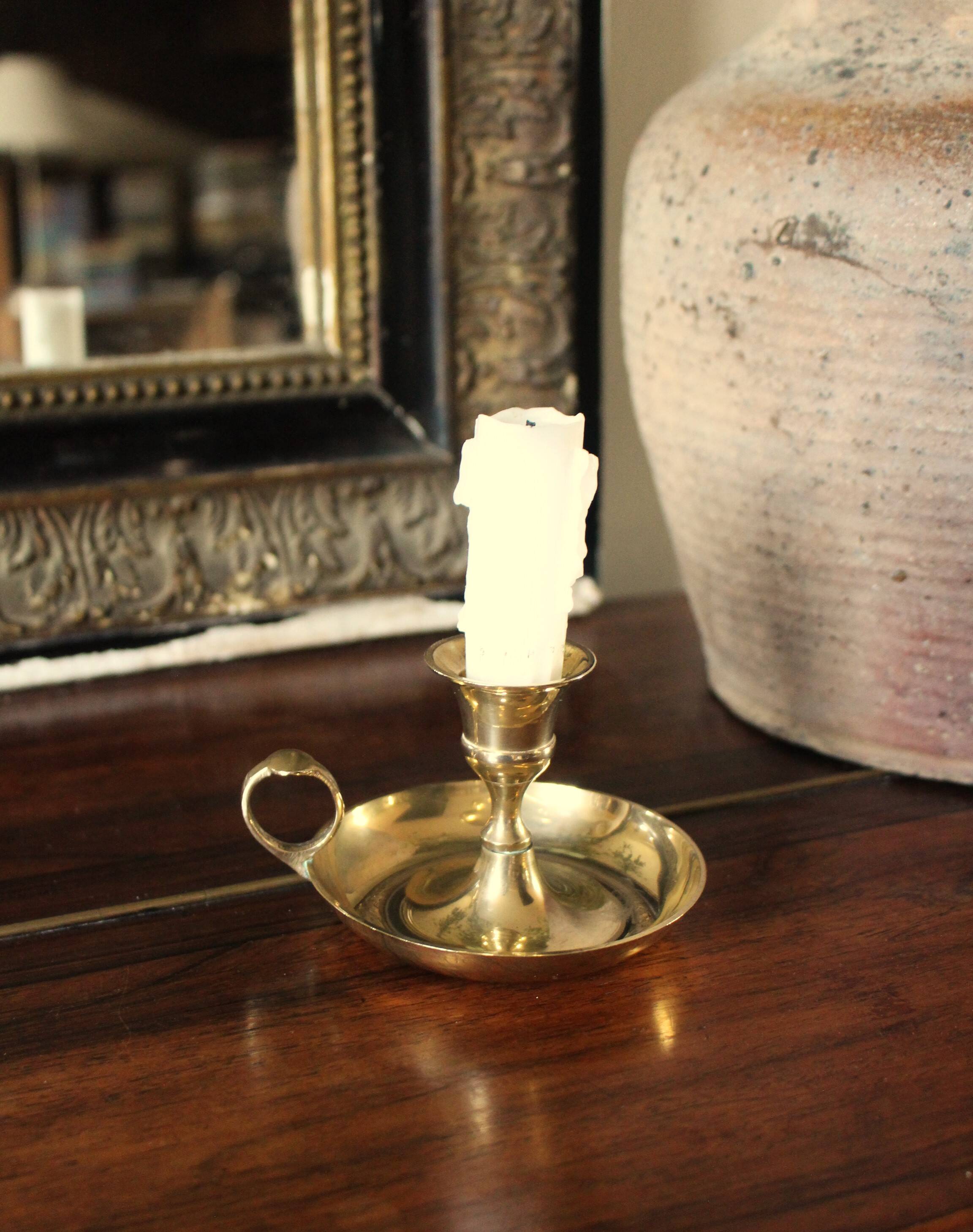 Round brass cellar rat candle holder