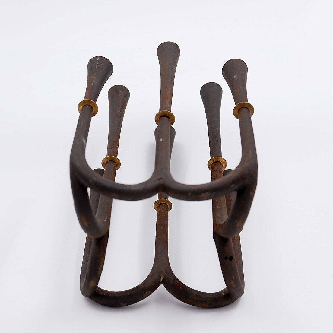 Cast iron and brass candle holder by Jens Quistgaard for Dansk designs, 1960