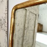 Antique gilded Louis-Philippe mirror, 19th century.