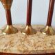 Set de trois bougeoirs vintage bois et laiton