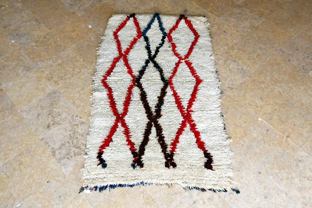 Small vintage beni ouarain rug