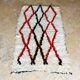 Small vintage beni ouarain rug