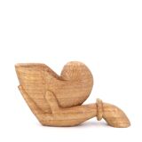 Wooden hand emptier holding a shell, 1970s