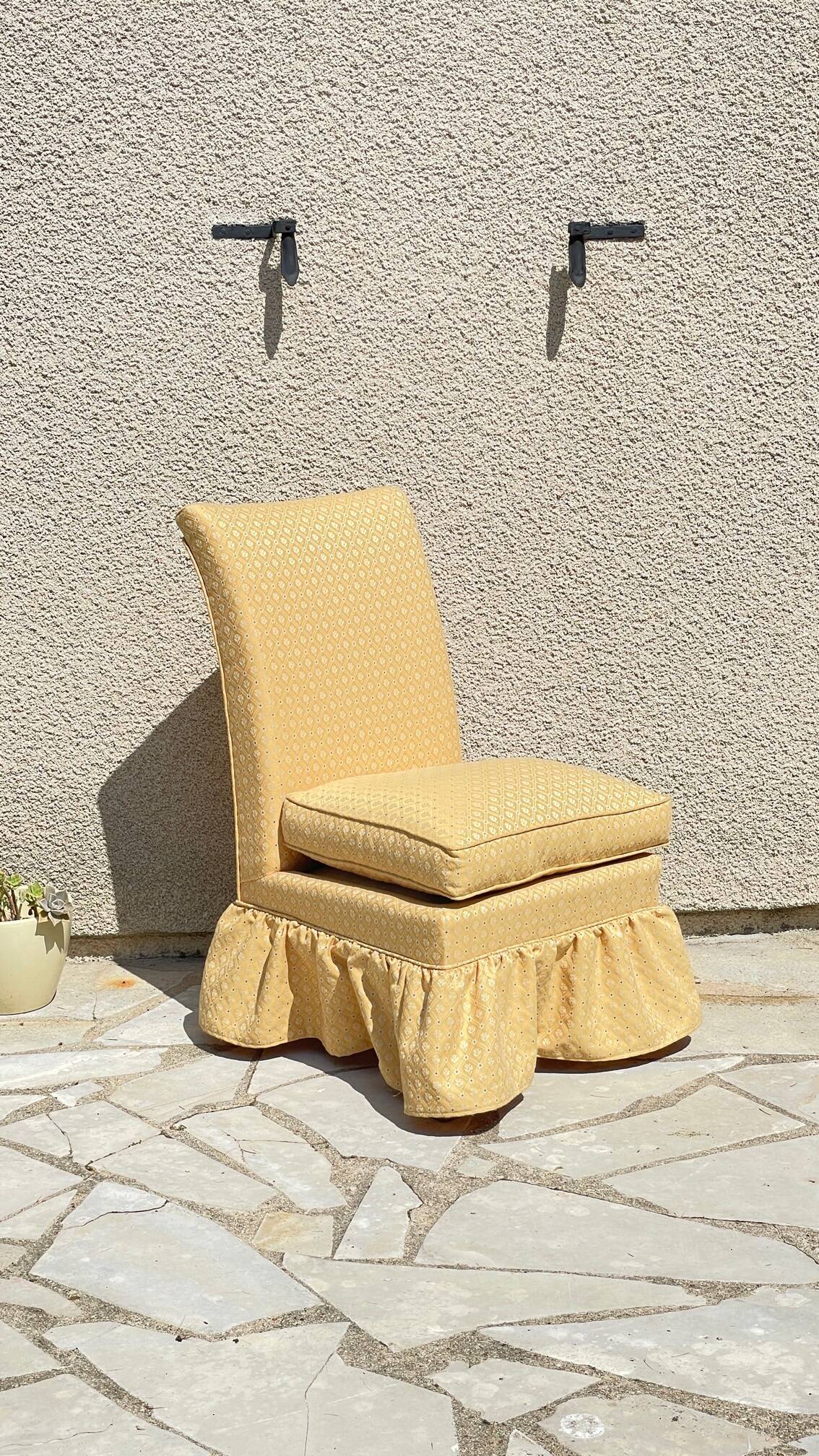 Vintage upholstered fabric toad armchair