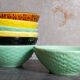 Seven vintage slip ceramic bowls