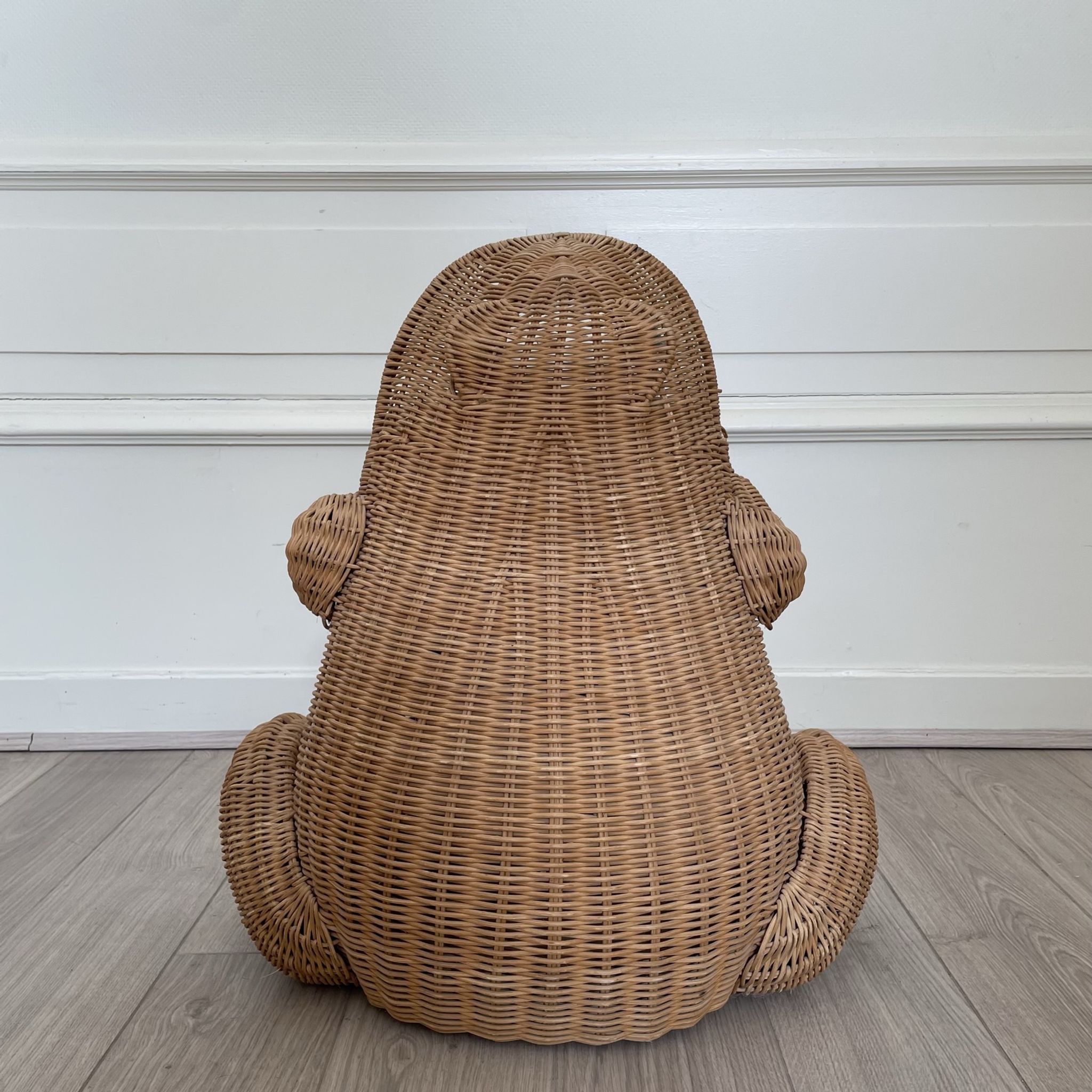 Wicker frog magazine holder by Olivier Cajan