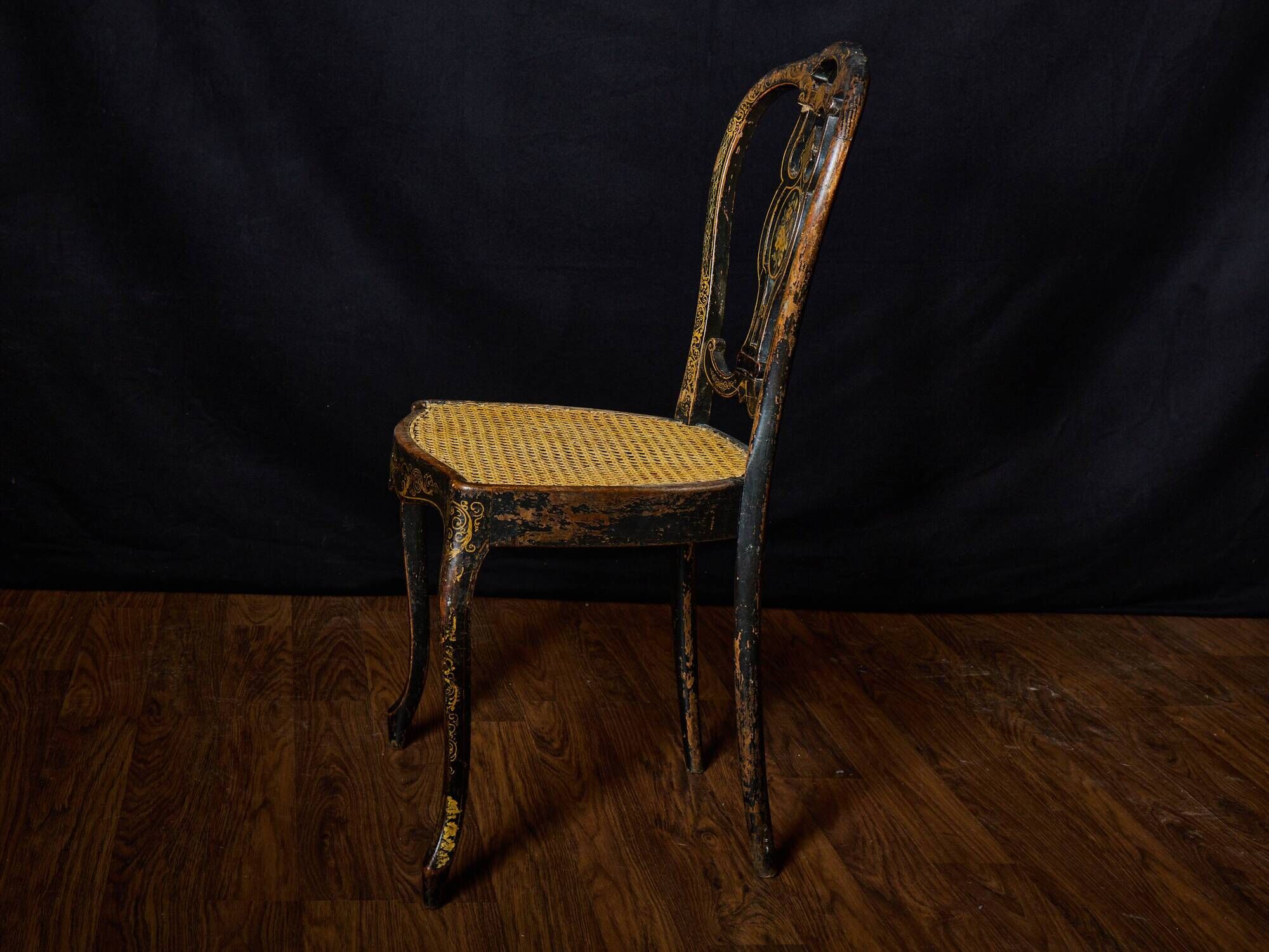 Antique black and gold lacquered chair – Napoleon III style – caned seat