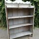 Old white shelf in weathered pine