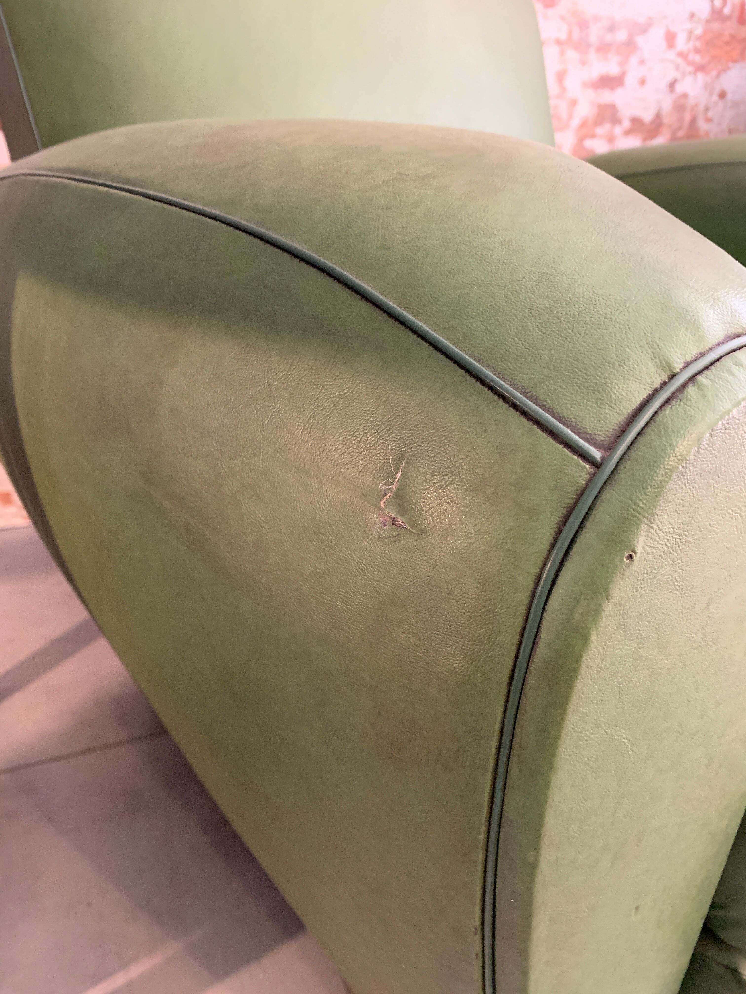 Pair of mustache club armcairs in green skai