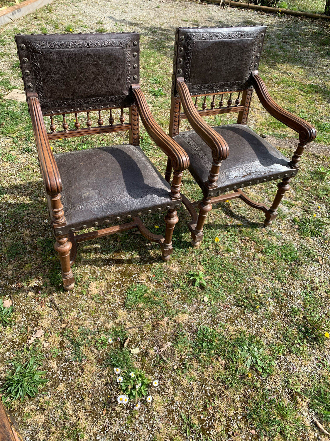 Pair of henri ll leather armchairs pushed back end 19 th