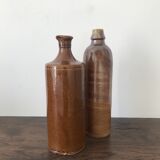 Pair of sandstone bottles