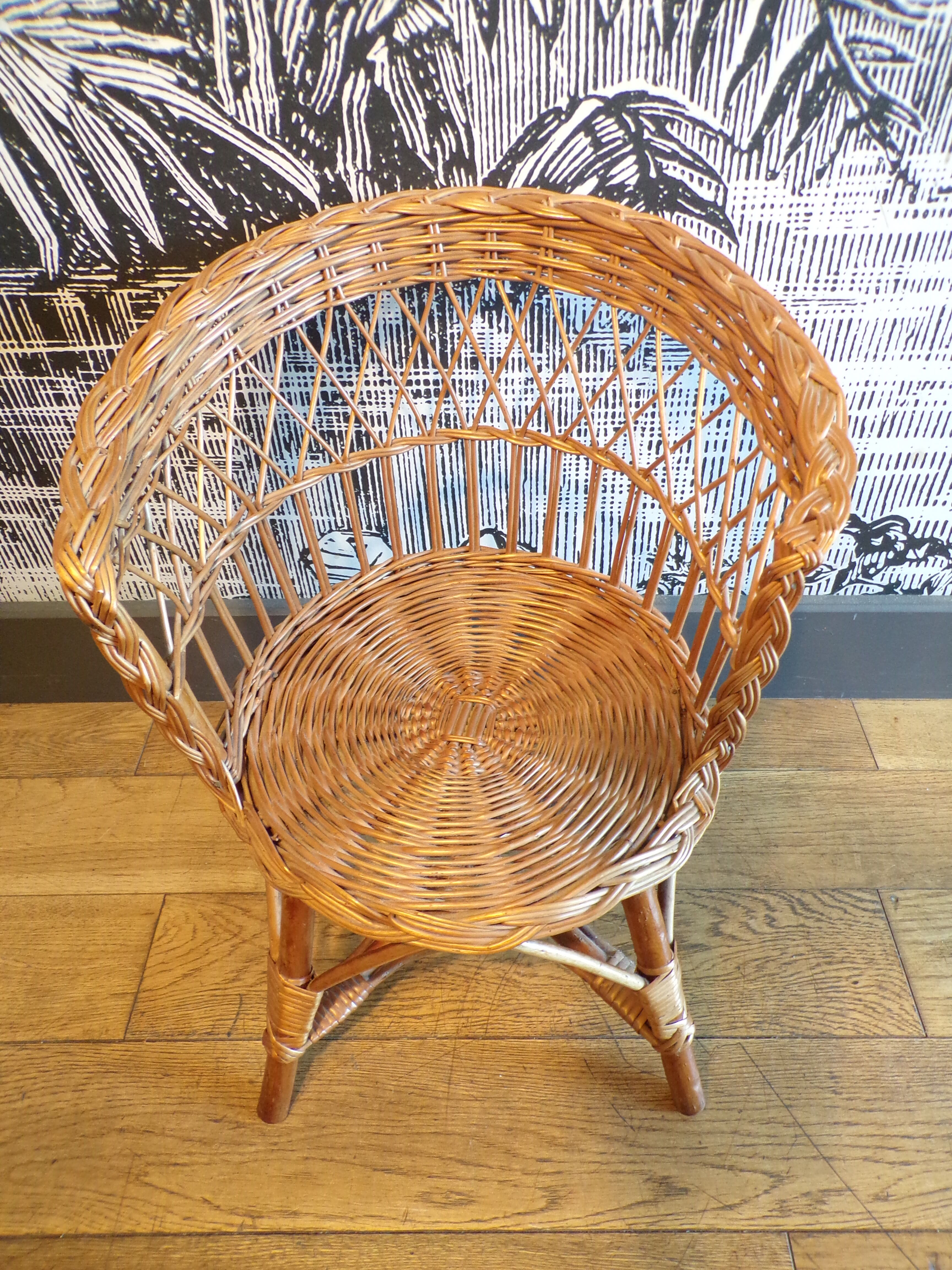 Vintage children's armchair in wicker