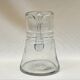 Ancienne carafe  pichet en verre soufflé  décor de feuilles ciselées 1940