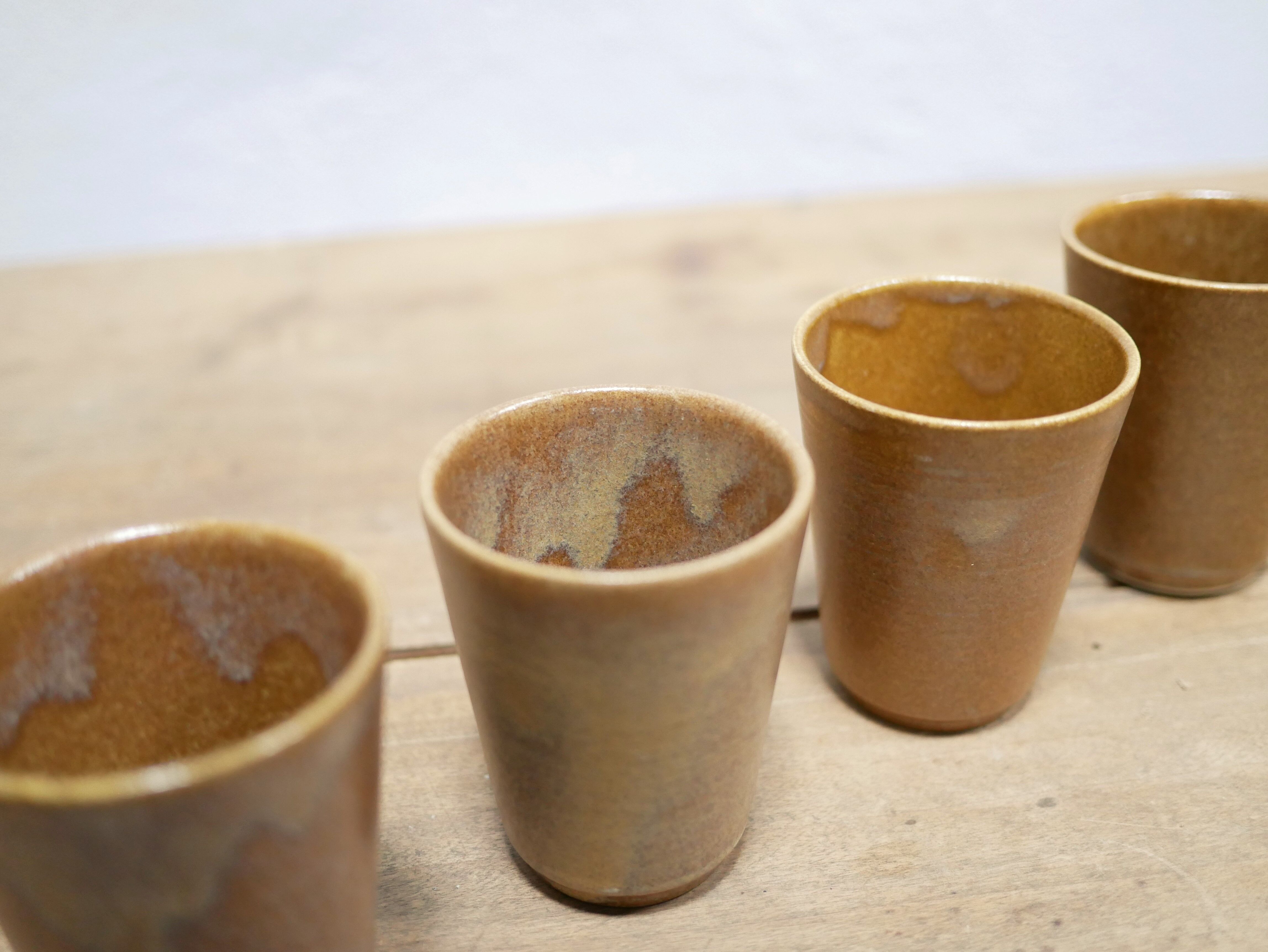 Series of 4 vintage stoneware glasses by the manufacture of Digoin, France