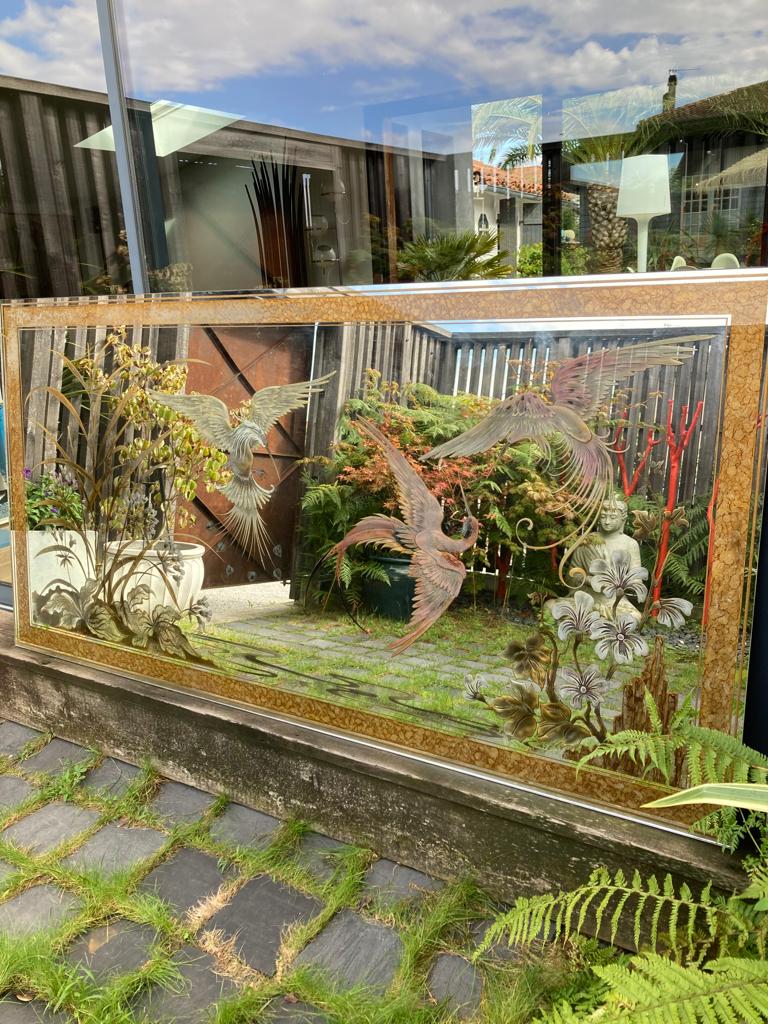 Mirror decorated with birds