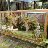 Mirror decorated with birds