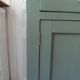 Vintage Parisian sideboard with 2 doors and 2 drawers, re-enchanted in smoky green.
