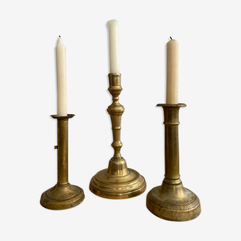 Trio of vintage bronze and brass candlesticks