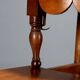 Antique walnut shelf in a semi-round shape, Italy, 19th century.