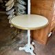 Bistro table in cast iron and beige melamine ⌀ 60 cm