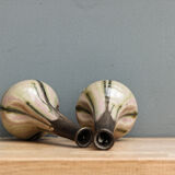 Pair of glazed sizzlings, signed