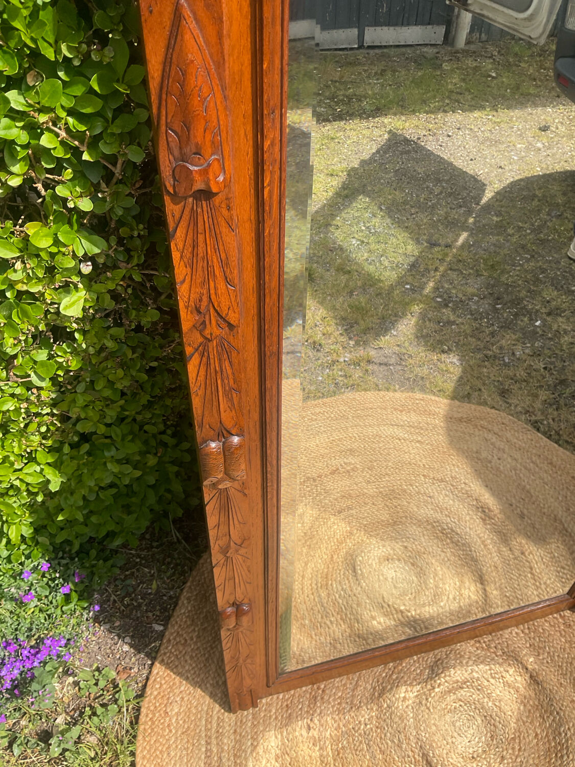 Antique large trumeau mirror in solid wood and bevelled glass.