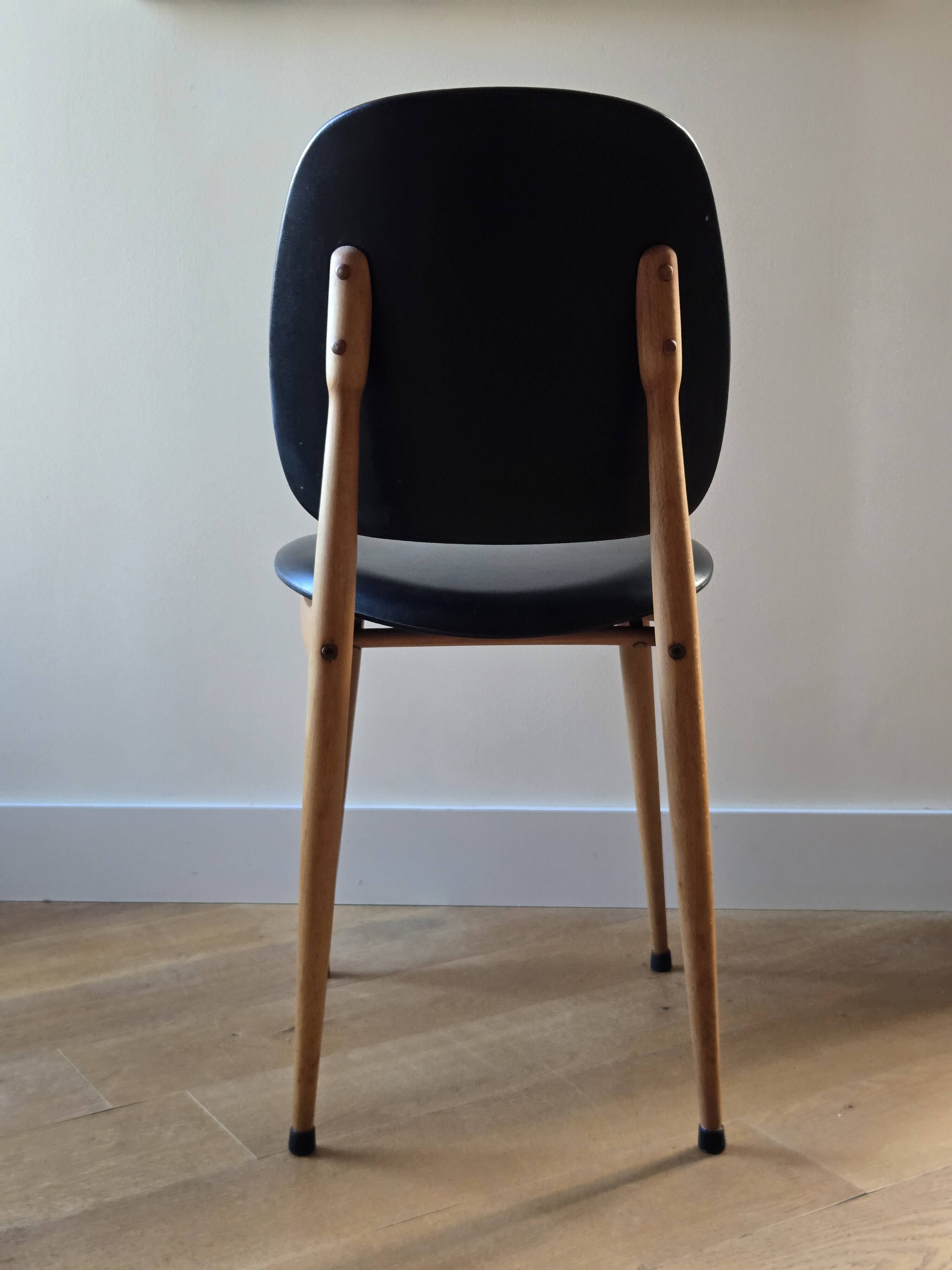 Pair of Baumann Pegasus chairs in wood and leather - design by Pierre Guariche