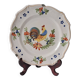 Decorative plate in earthenware with rooster design. Late 19th century.