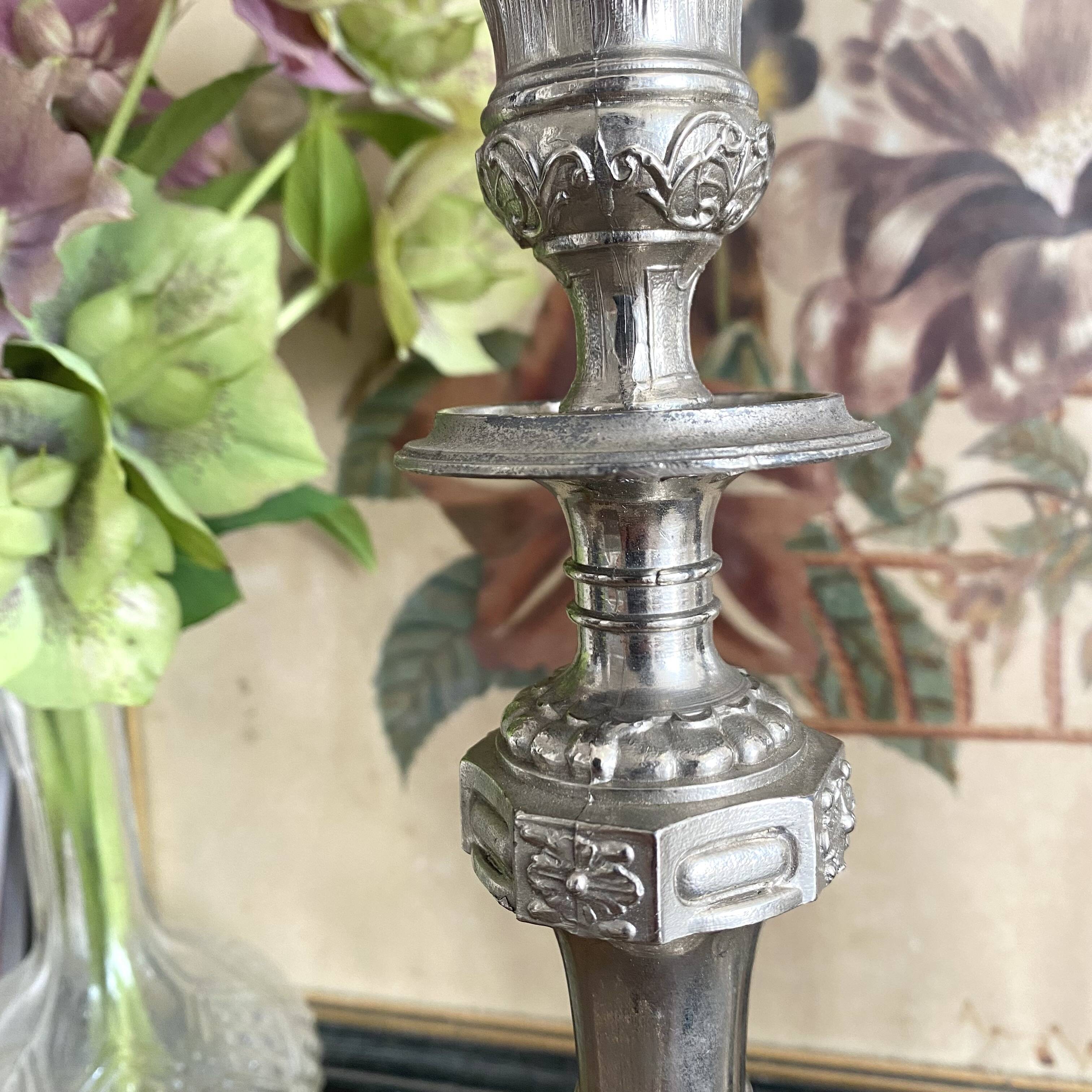Antique silver-plated metal candlesticks
