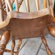 Four chairs and a Heywood Wakefield Windsor armchair. Vintage