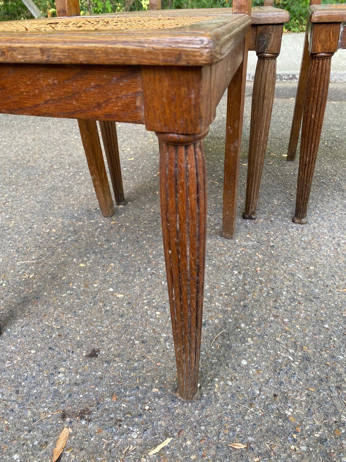 4 Art Deco chairs in solid oak with caning from the 1920s.