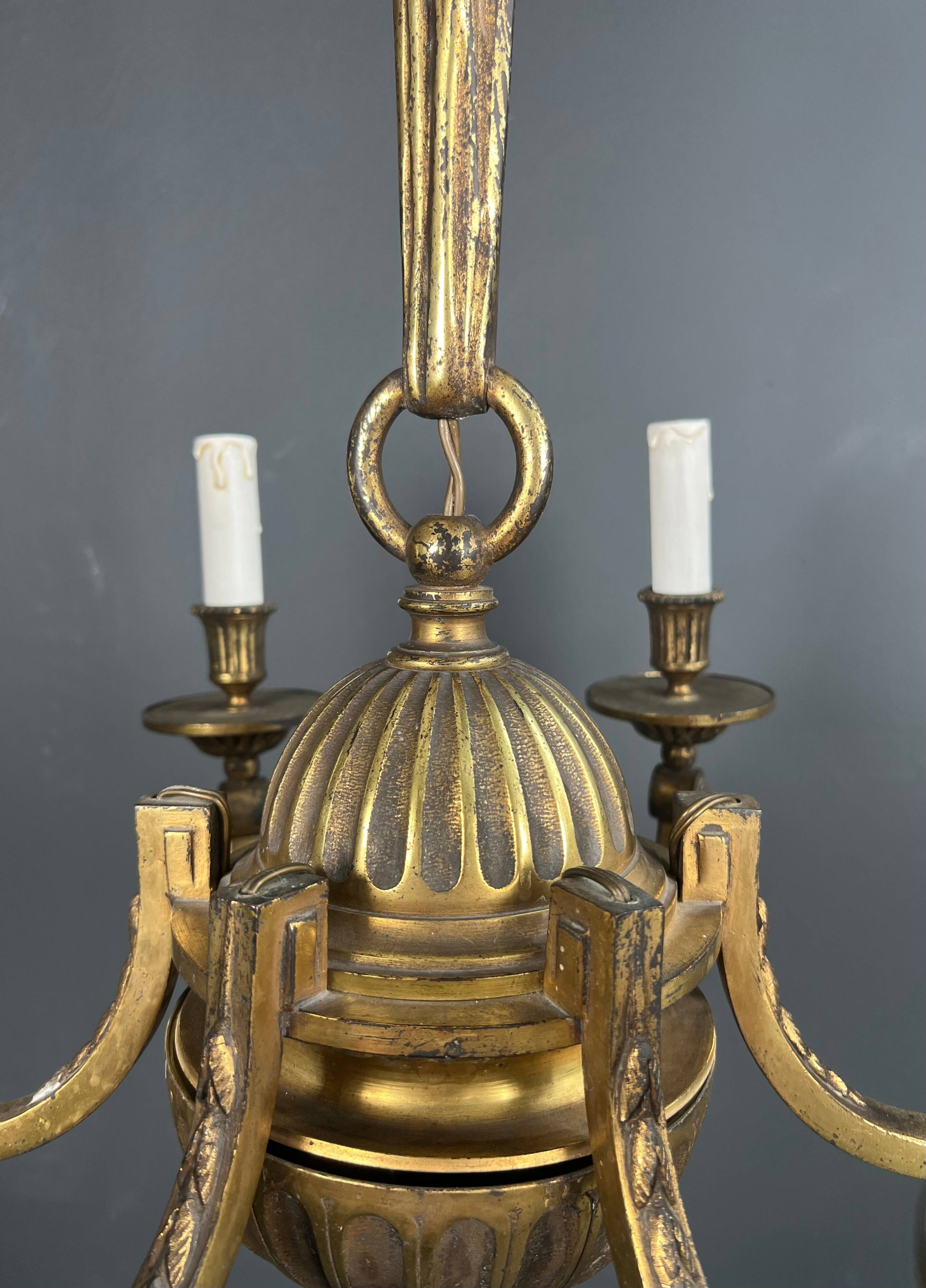 Bronze chandelier in Louis XVI style with 6 arms.