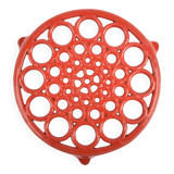 Vintage red enameled cast iron trivet