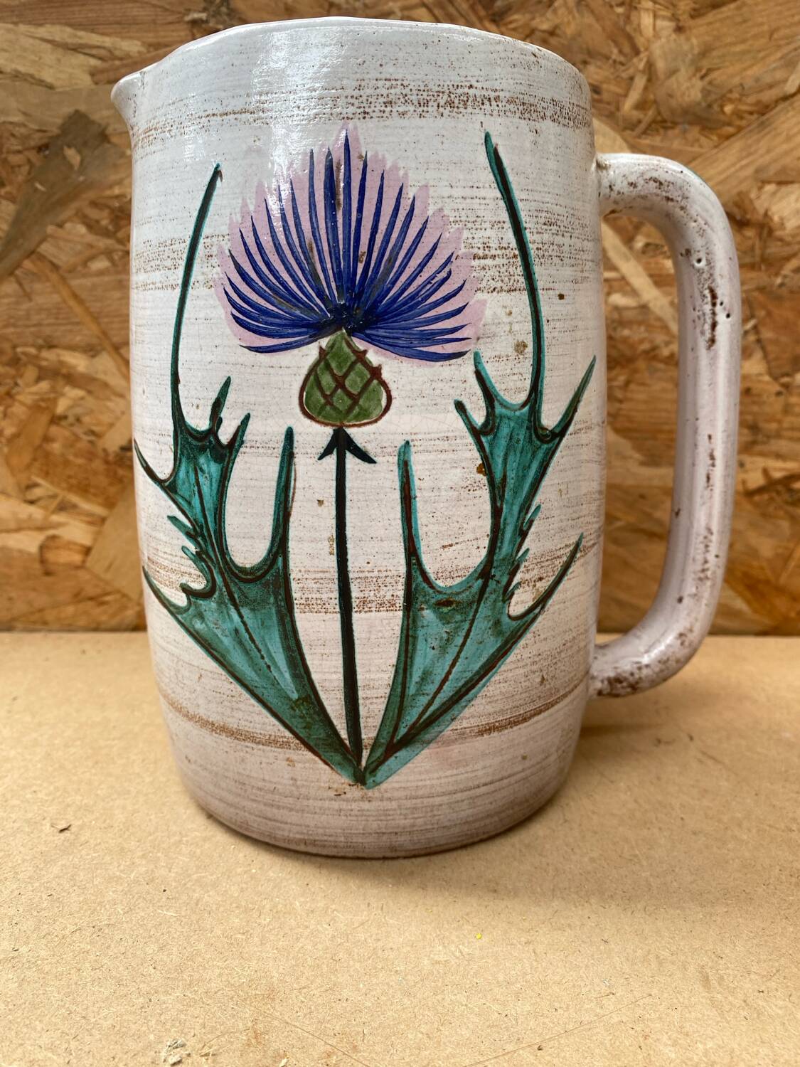 Antique vallauris ceramic pitcher with vintage blue thistle decor