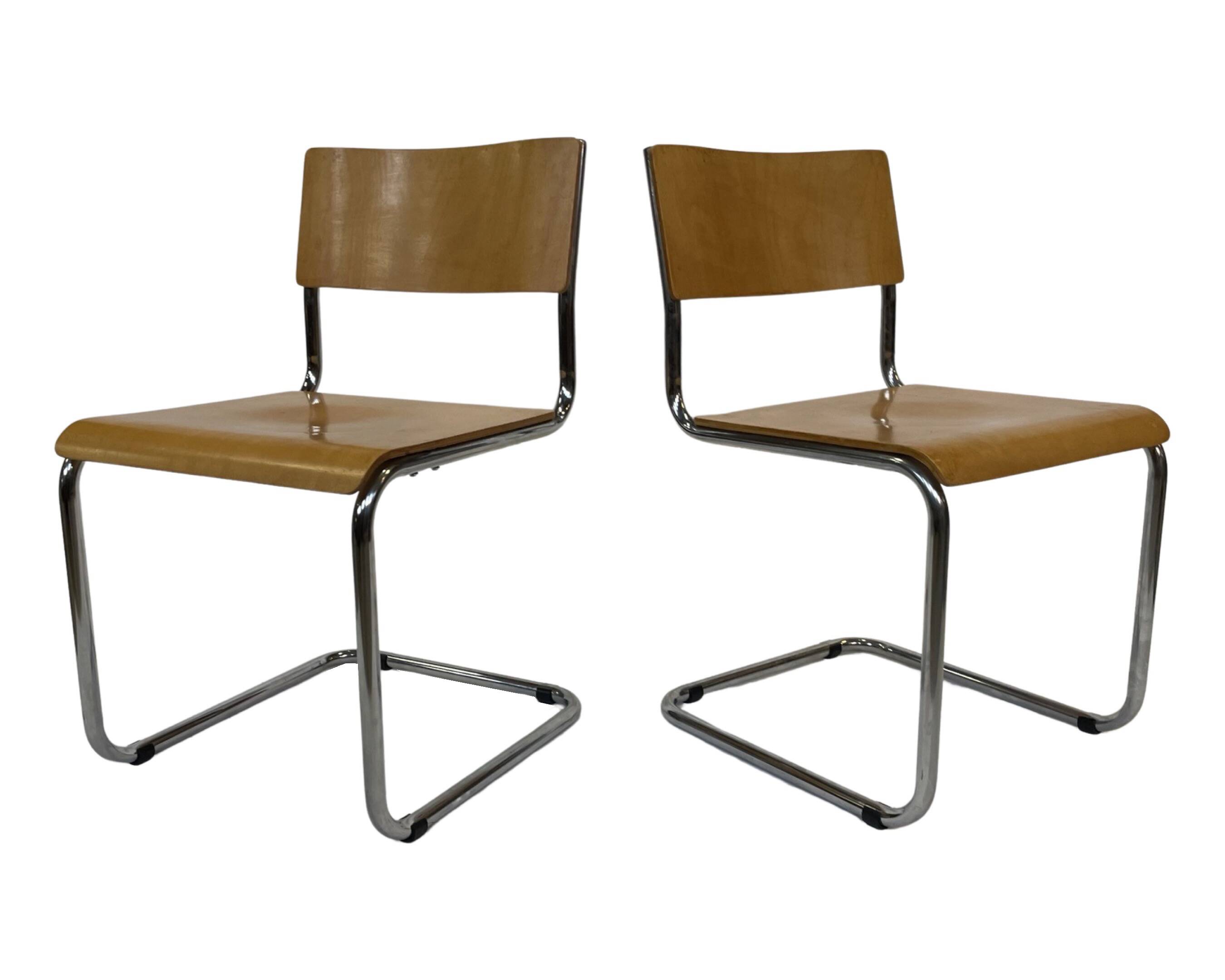Set of four vintage dining room chairs, wood and chrome,  1970s