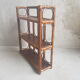 Rattan wall shelf