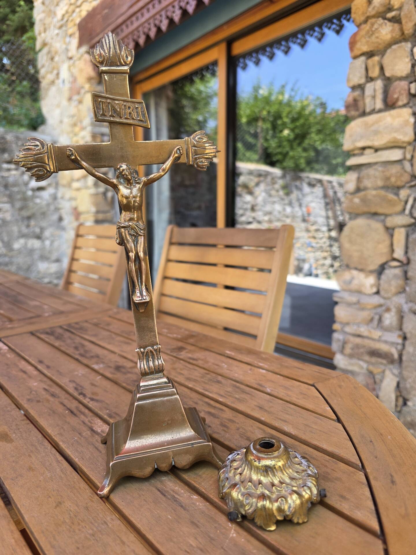 19th-century brass crucifix on a base