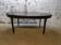 Oval Louis XVI style table with half-moon extensions.