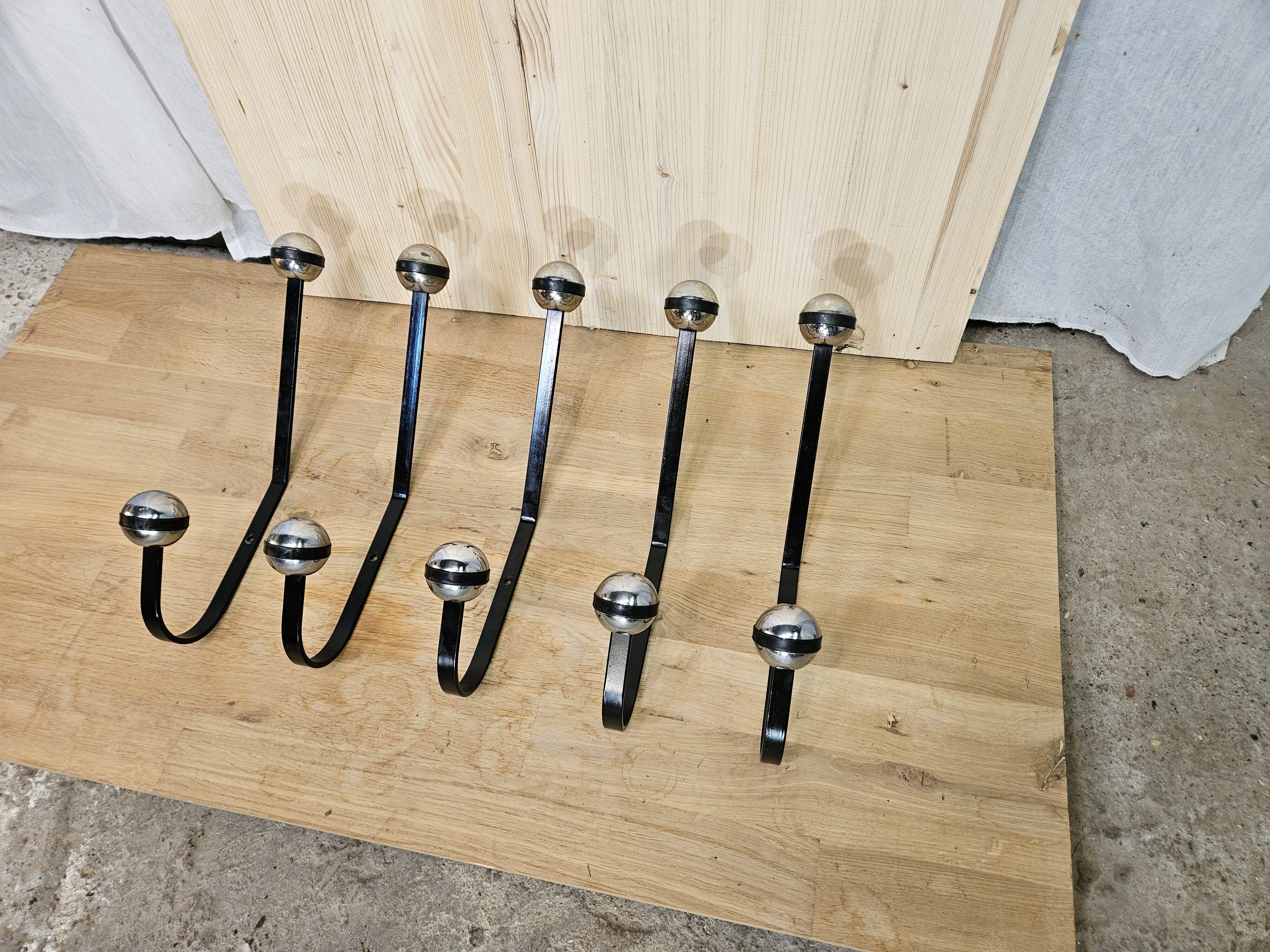 5 black and silver coat hooks from the 60s