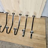 5 black and silver coat hooks from the 60s