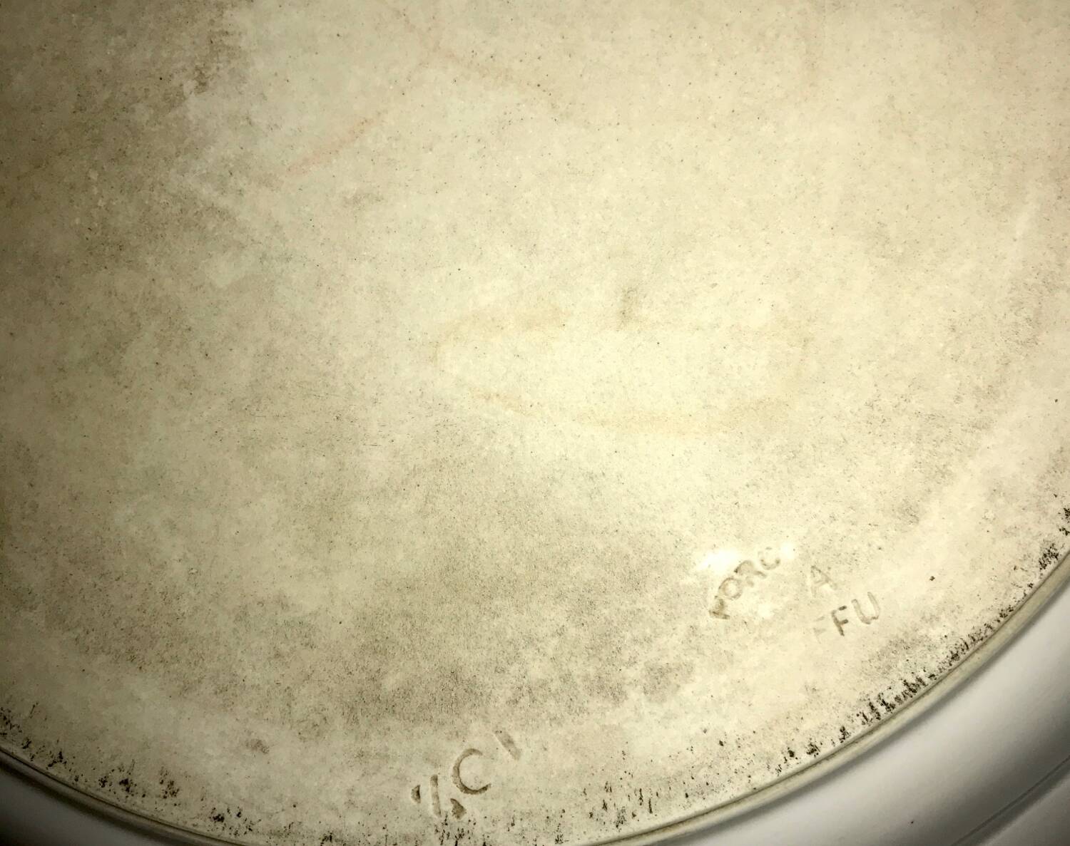 Hollow dish in fired porcelain with floral motifs